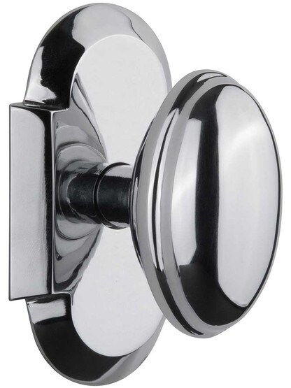 Arched Rosette Door Set with Homestead Knobs in Polished Chrome.